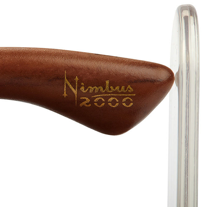 Close-up of the Nimbus 2000 logo on a wooden broom handle