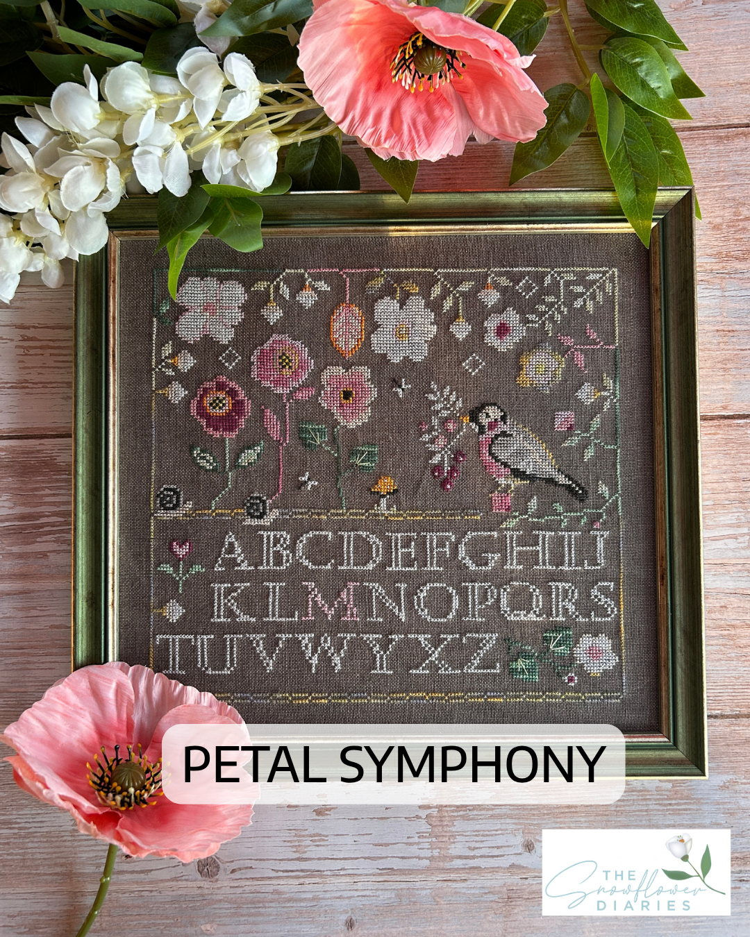 Petal Symphony cross stitch pattern by The Snowflower Diaries with floral stitched design