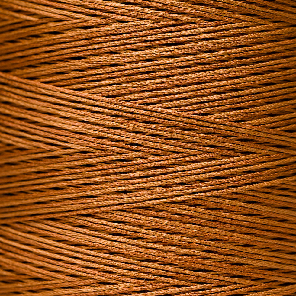 Close-up of brown thread wound tightly WDW 1228 – Pecan with dark lines.