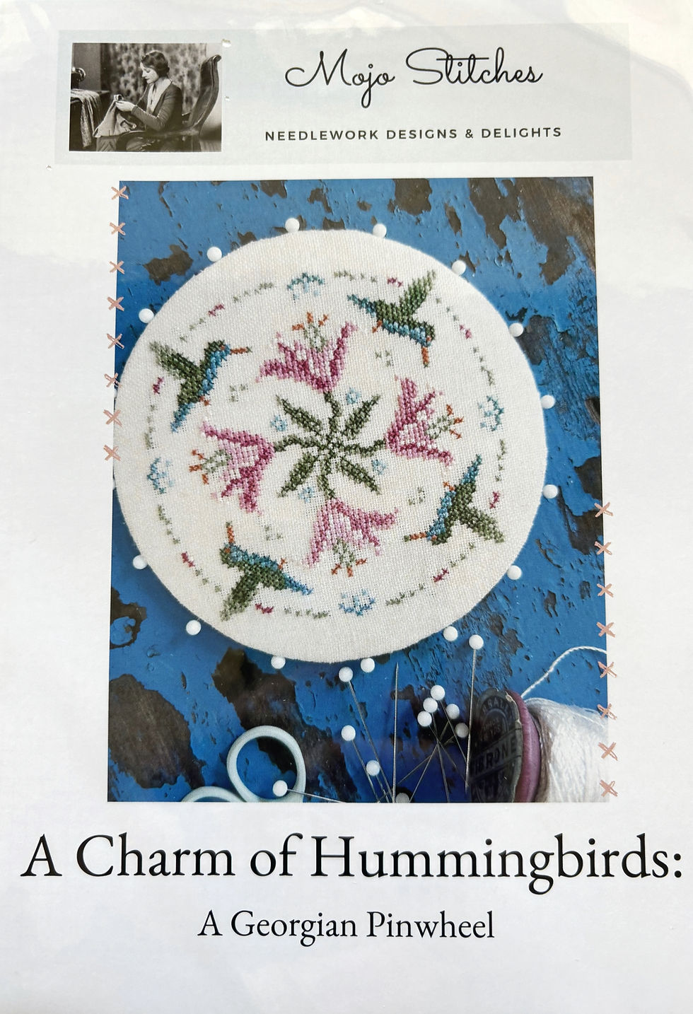 Mojo Stitches needlework featuring A Charm of Hummingbirds: A Georgian Pinwheel design.