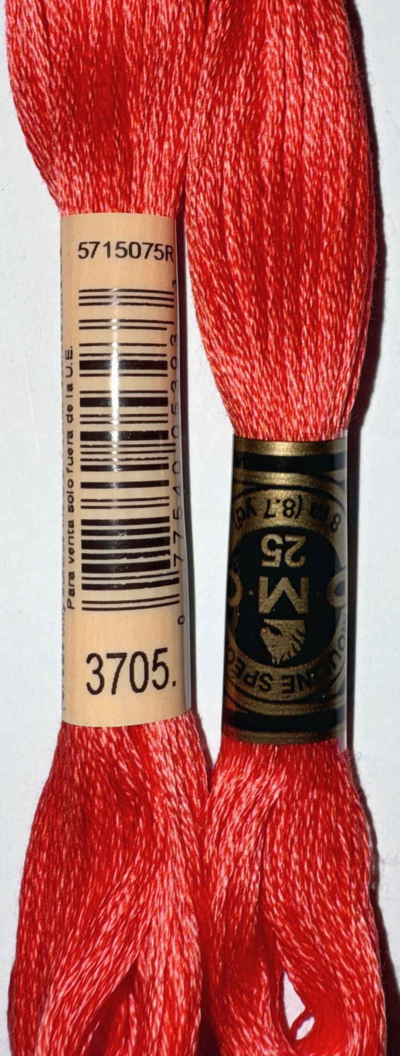 DMC 25 floss, barcode, and color number 3705. Red thread, ready for Bloomfield Craft.