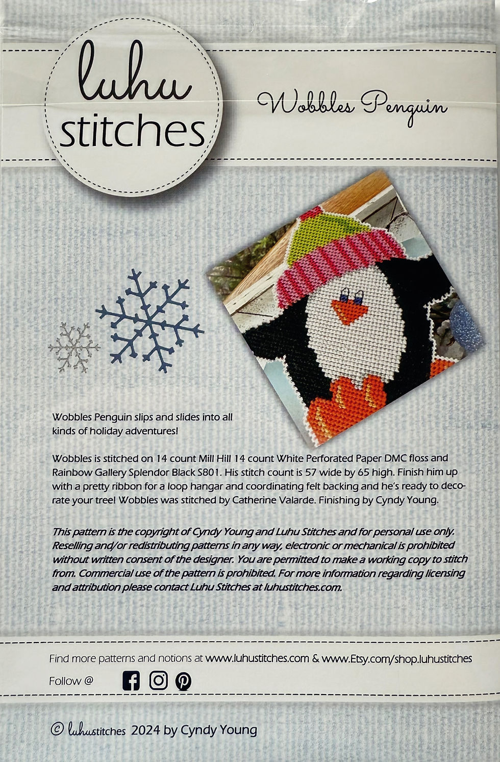 Thumbnail: Back cover showing Wobbles Penguin details, stitch count, and finishing information.