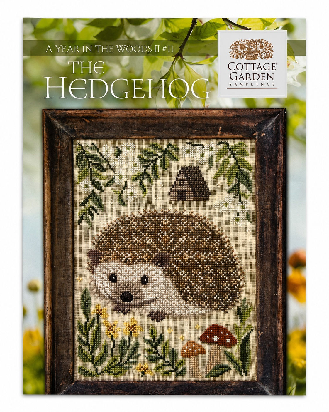 The Hedgehog cross stitch pattern cover by Cottage Garden Samplings with woodland hedgehog, flowers, foliage, and mushrooms.