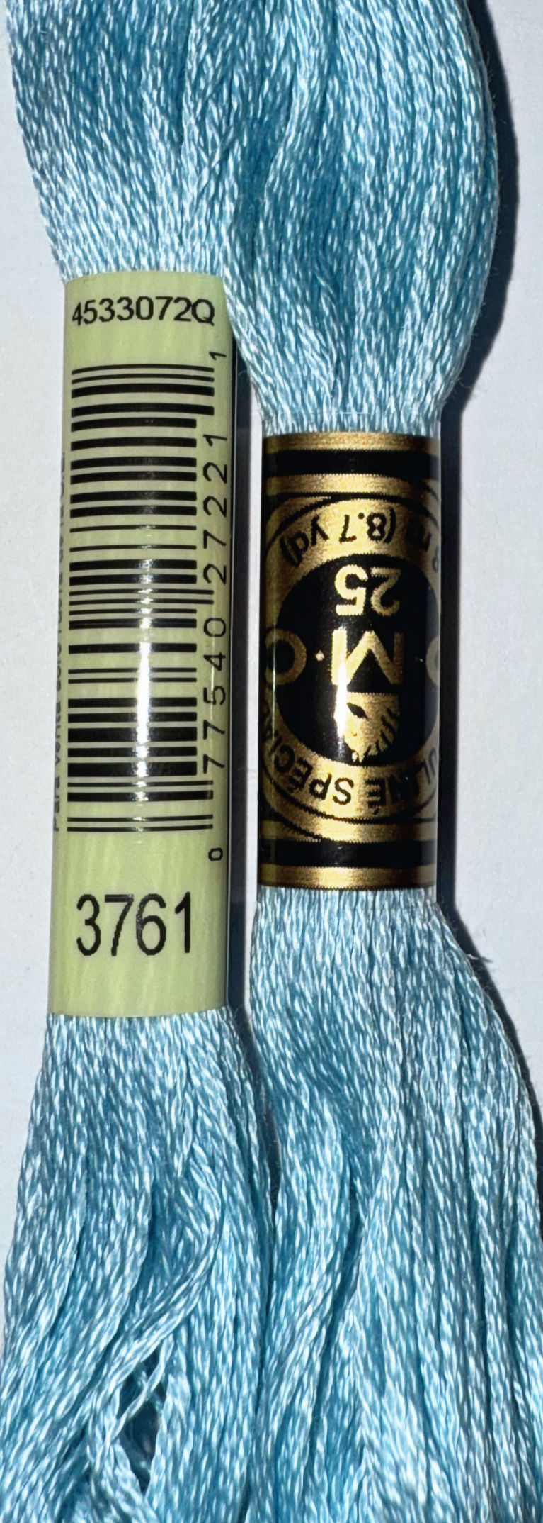 DMC floss spools with barcode, number 3761, and M.C. 25 label Bloomfield Craft