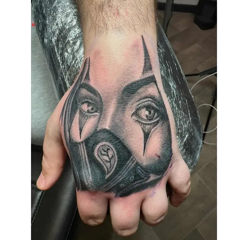 A picture of a black and grey tattoo