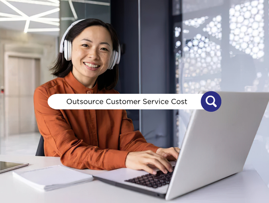 Smiling woman in orange shirt wearing headset types on laptop; search bar reads Outsource Customer Service Cost in office.