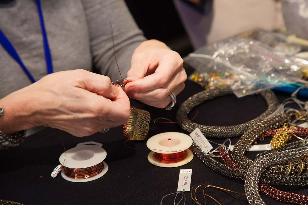 Thumbnail: A pair of hands holding wire.