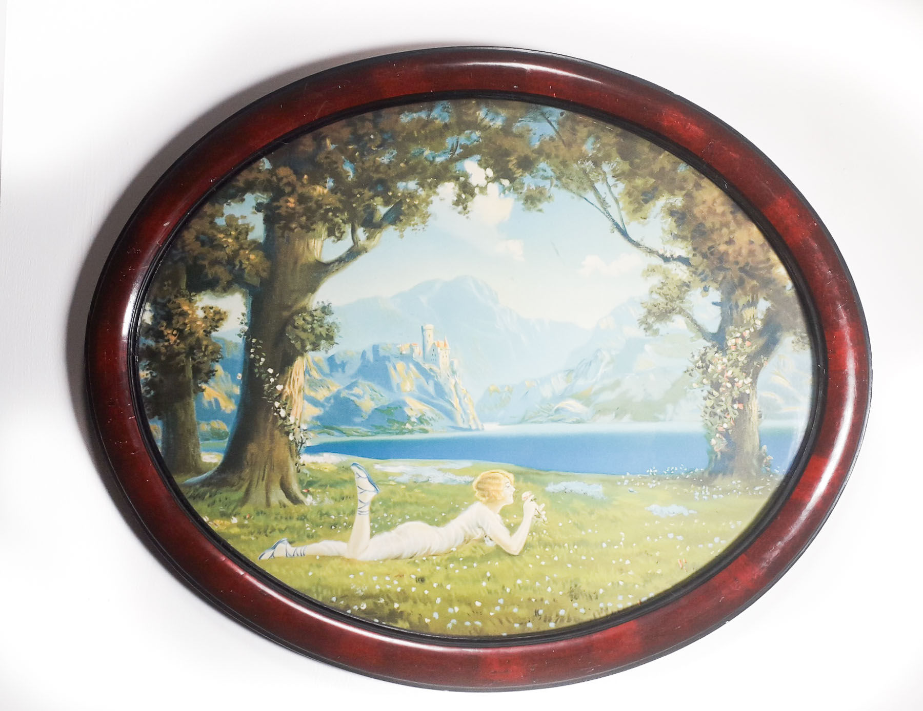 Atkinson Fox prints in wooden oval frame.
