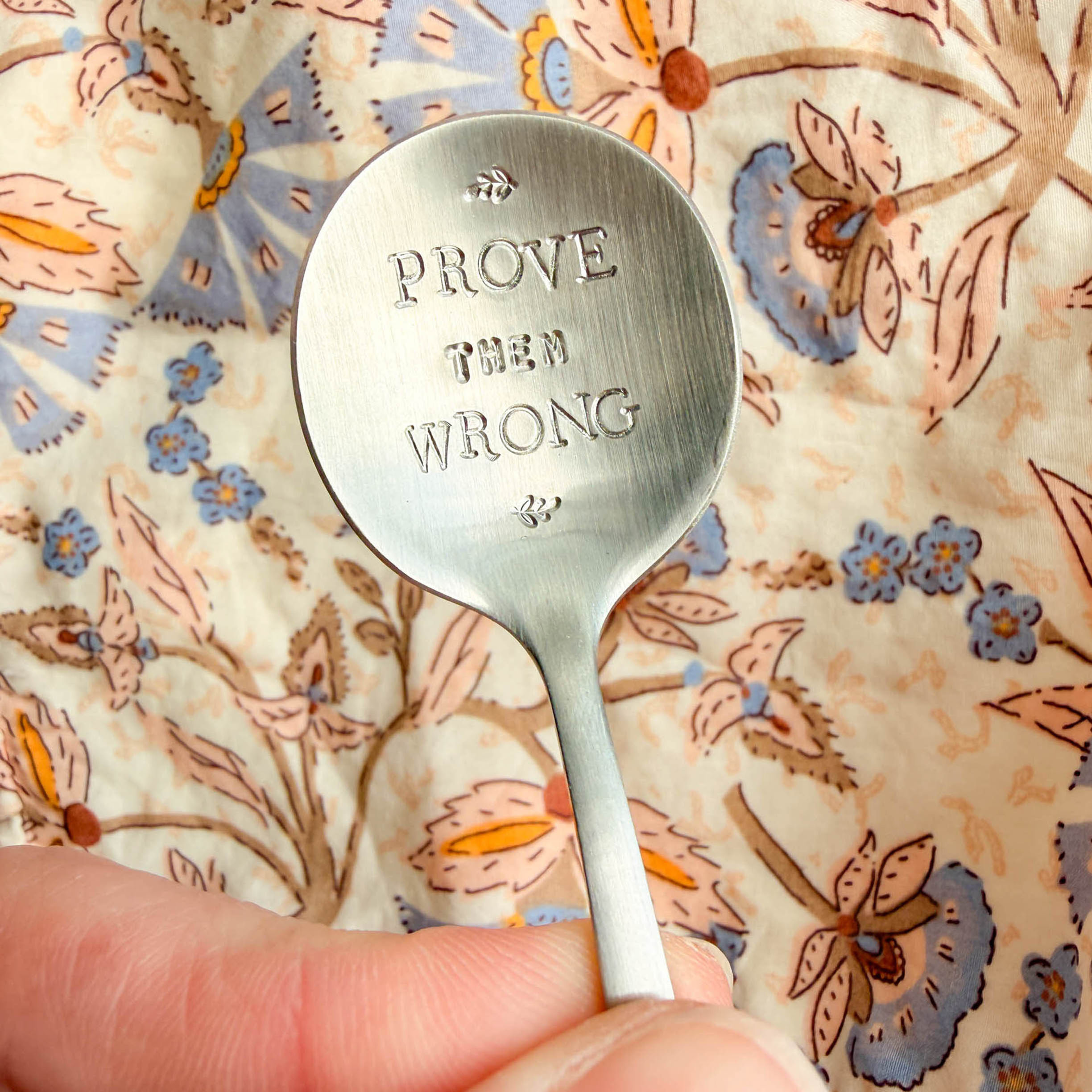 'Prove them wrong' round teaspoon