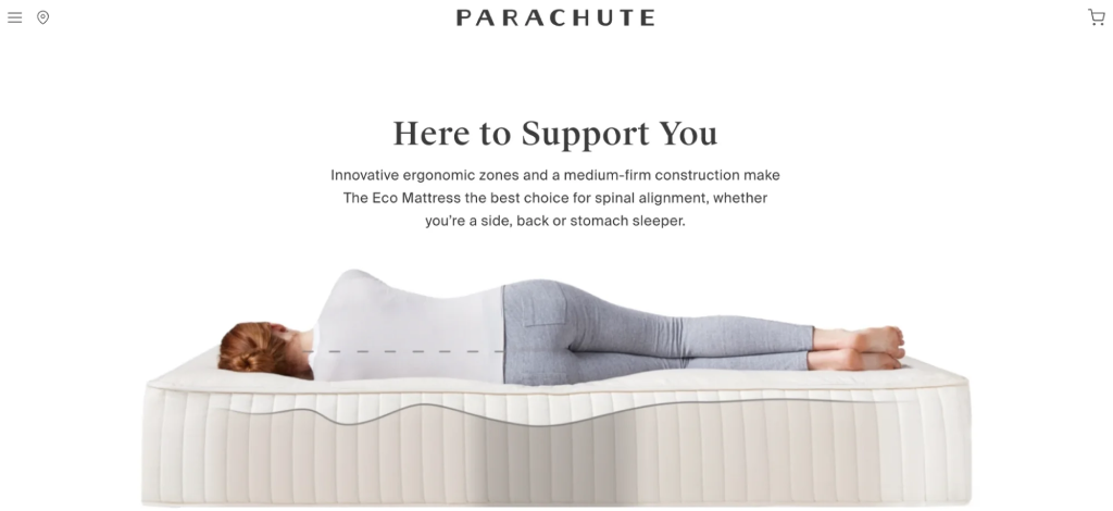Tiêu đề trên trang web của Parachute có nội dung “Chúng tôi luôn sẵn sàng hỗ trợ bạn” với hình ảnh một người phụ nữ nằm trên nệm.