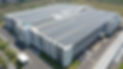 Modern factory building with roof mounted solar system.jpg