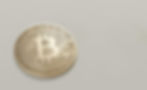 Gold bitcoin beige background