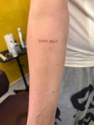 Book a slot at our affordable tattoo studio in Sheffield to get a fine line tattoo 'don't quit' two for fifty pounds tattoos best price