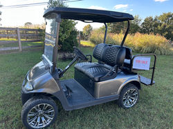 Golf Cart with 3-6" lift and new wheels with diamond stitched seats and rear bench seat addition