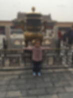 With kids at the Forbidden City in Beijing
