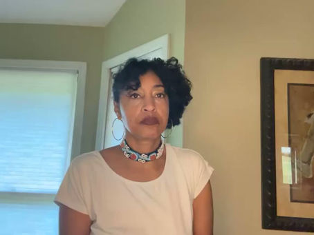 Black woman with beaded necklace