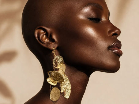 black woman in gold earrings