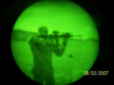 Me aiming M-4 in night vision