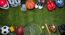 Various-Sport-Equipments-On-Grass-949190