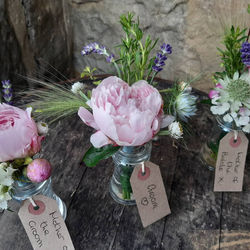 Locally grown flowers in jam jars