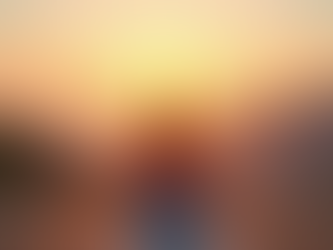 woman in a relaxed yoga pose at sunrise