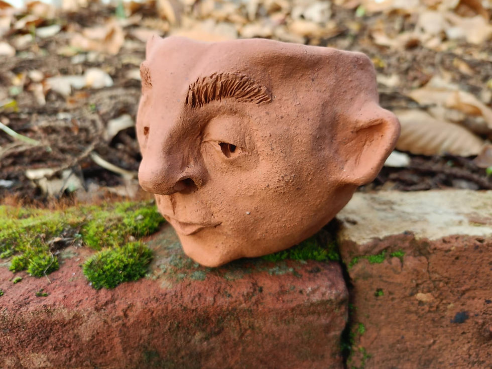 Thumbnail: handmade terracotta face pot
