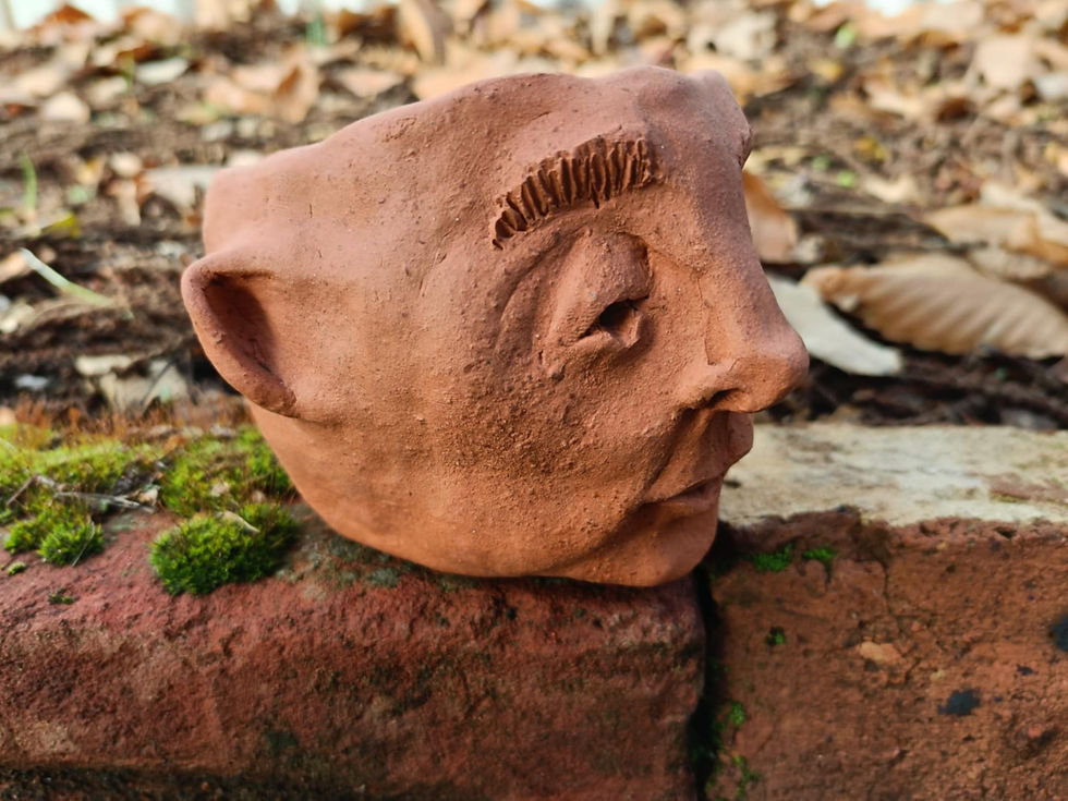 Thumbnail: handmade terracotta face pot