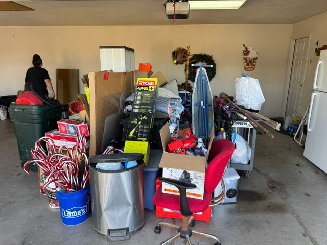 Cluttered garage ready for full service junk removal