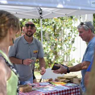Greeting customers with cured meats