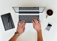 a pair of hands typing