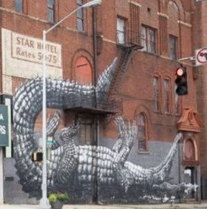 3D Mural on the side of the Atlanta Cleaners