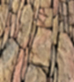 Revestimento Wallboard Stone Pedra Moledo, blocos irregulares em tons de terra para um efeito tridimensional.