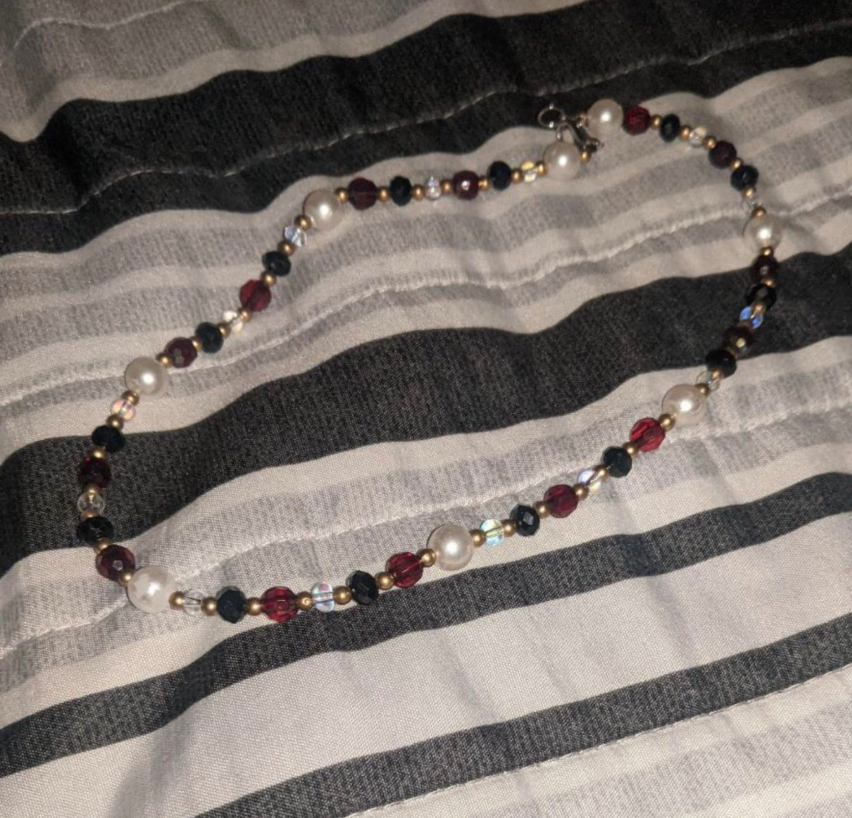red, black, & gold necklace 
