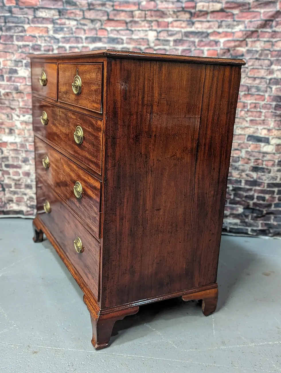 Thumbnail: A Victorian mahogany antique chest of drawers two short over three long drawers