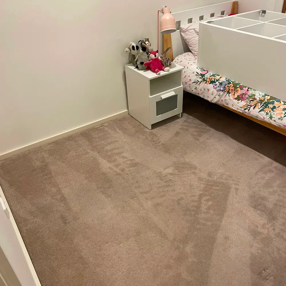 Residential bedroom plush carpet HEPA-13 vacuum extraction lines after deep spring cleaning by Whole Detail. 