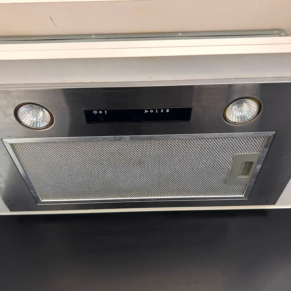  Stainless steel rangehood canopy and aluminum mesh filter cell detailed during 2 bed 2 bath spring cleaning. 