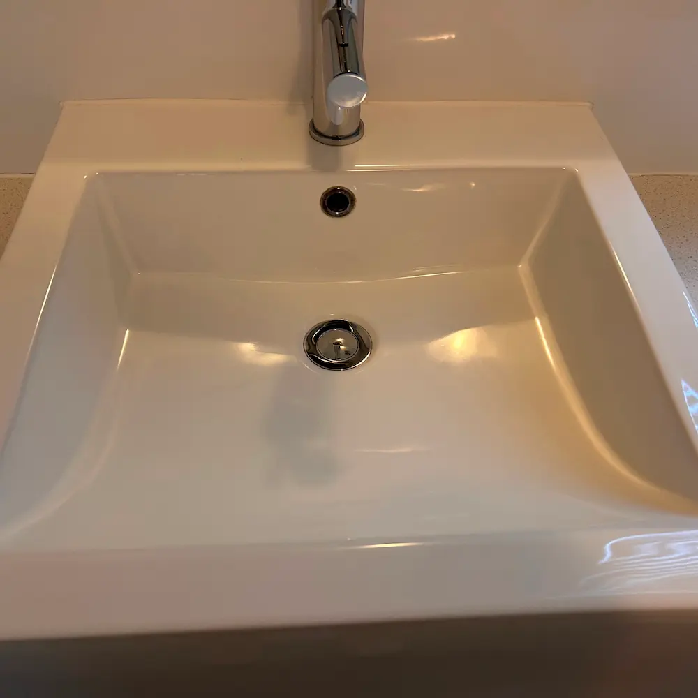  Ceramic vanity basin and chrome mixer tap descaled and polished by Whole Detail. 
