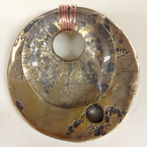 Bronze medal with glass
