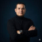 Eye-level view of a modern workspace with a sleek desk and a laptop