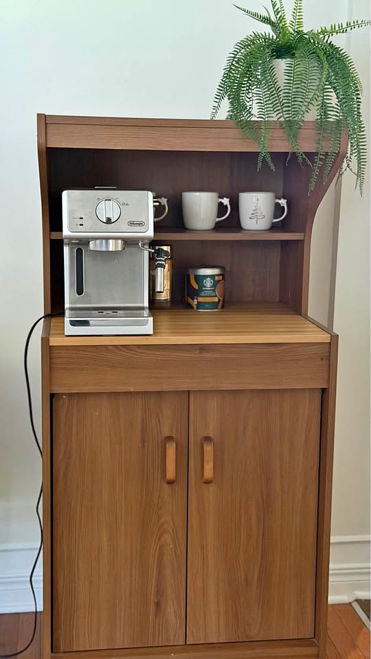 Retro mobile coffee bar with espresso machine and plant