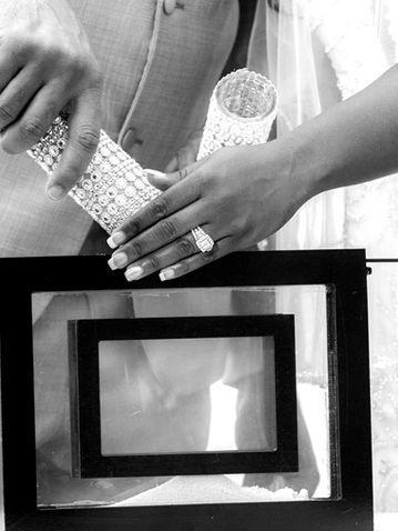 Black and white image of a sand ceremony on a yacht wedding in Fort Lauderdale, FL