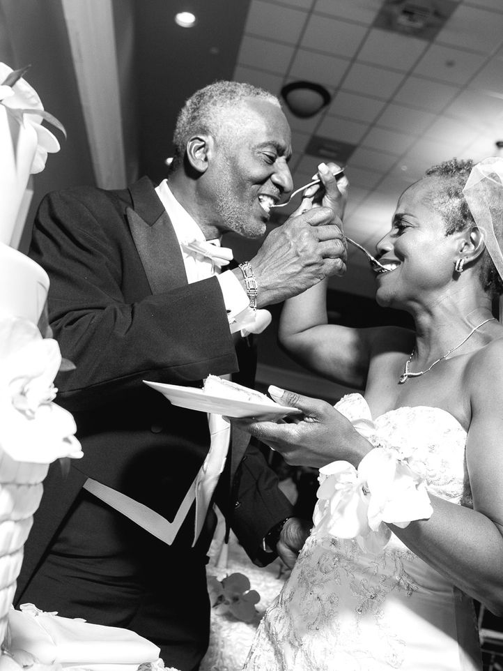 Black and white newlywed photo during cake cutting at Plantation Preserve Golf Course & Club in Plantation, FL