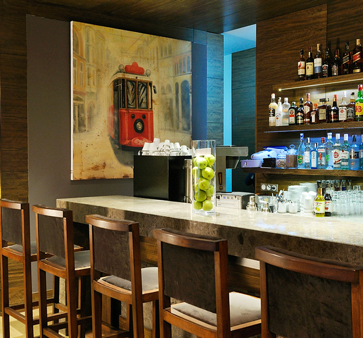 Modern interior of a luxury hotel featuring a spacious lobby and designer furniture.