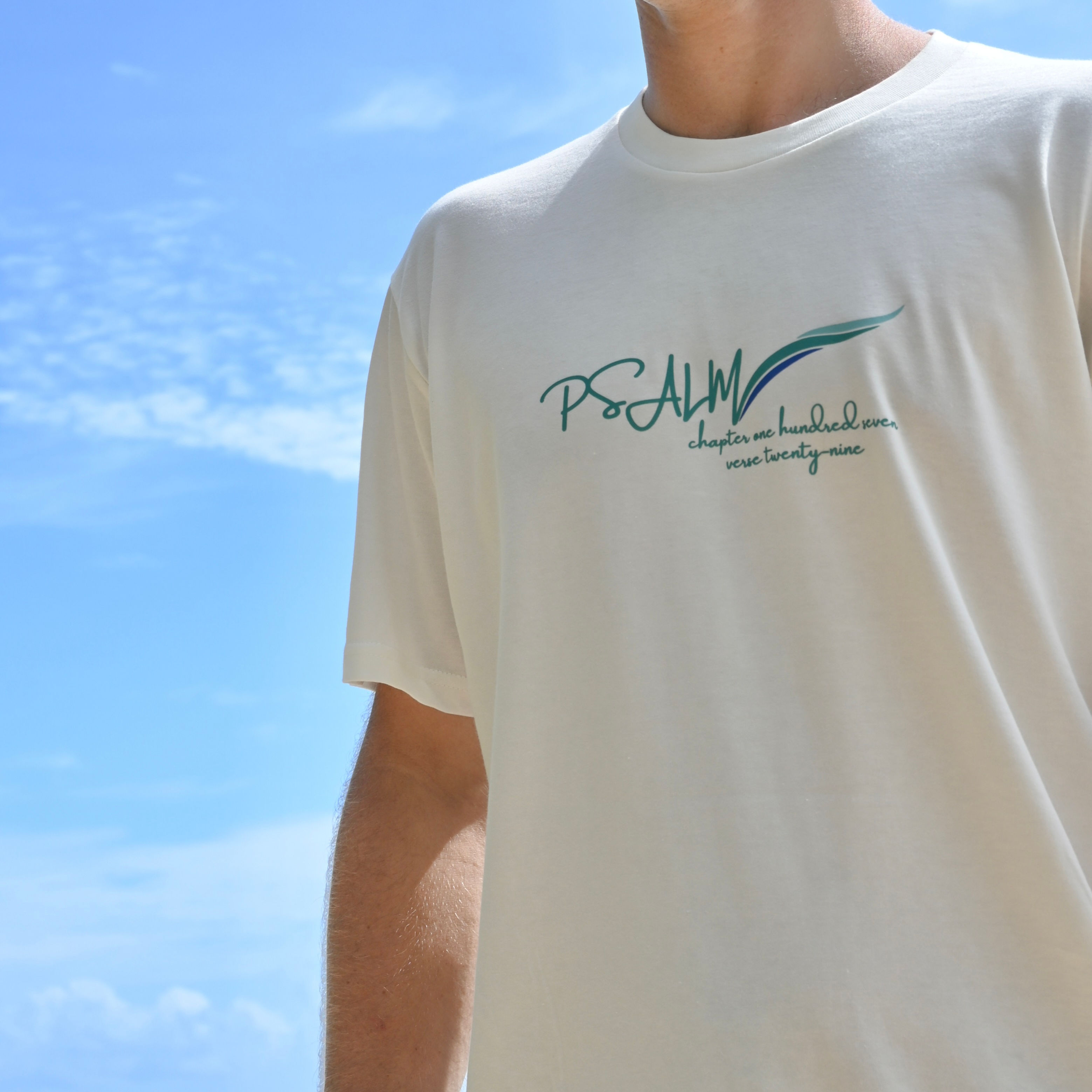 Psalm 107:29 KJV natural t-shirt, by Revive As The Corn.