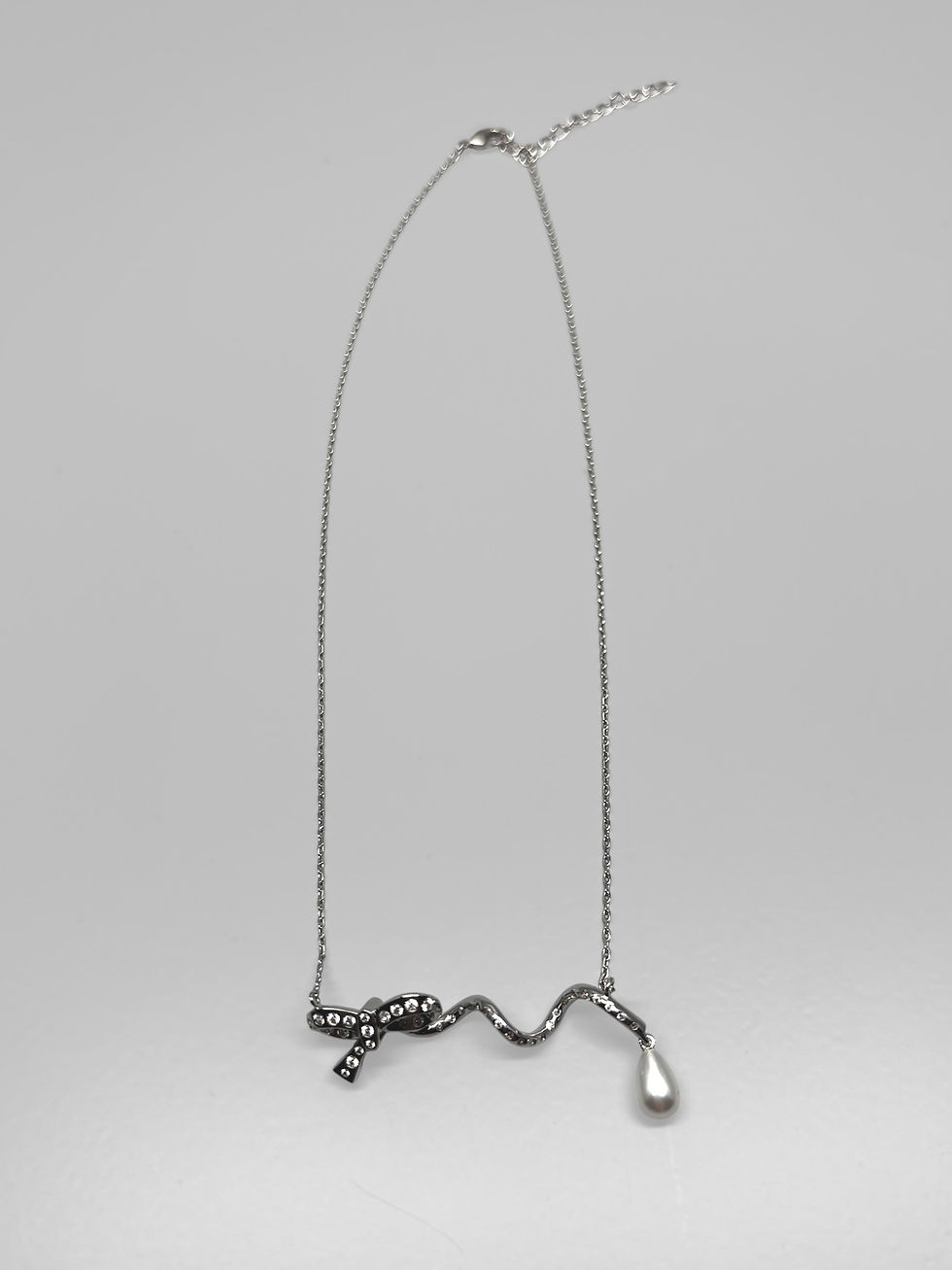 SERPENT BOW NECKLACE