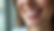 Close-up view of a smiling person showing off their dental implants