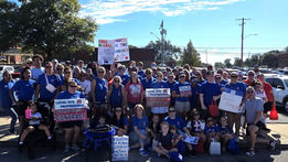 Member of the Cahokia Federation of Teachers rally fair contract during the local labor day parade