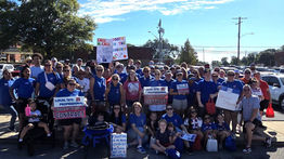 Member of the Cahokia Federation of Teachers rally fair contract during the local labor day parade