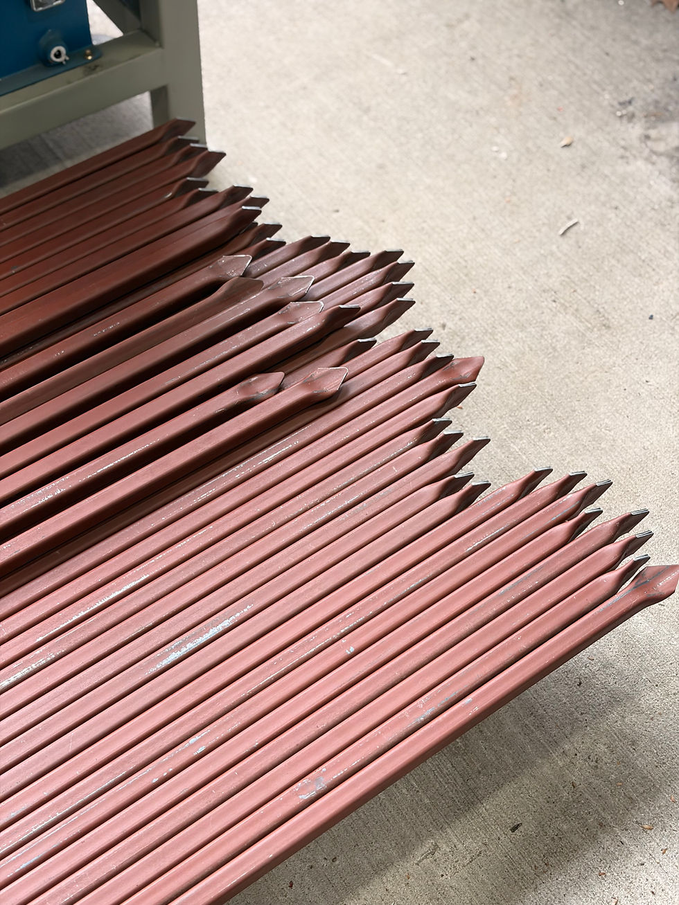 Thumbnail: 3/4 inch 16 gauge steel spear top pickets for driveway gates and metal fences with red primer finish.