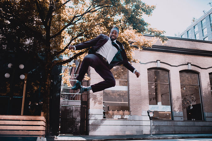 Jesse Lipscombe clicking his heels in the air